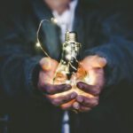 Light bulb in hands