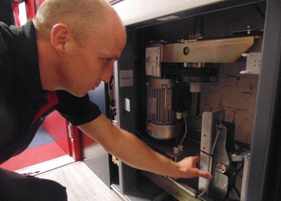 Gartec Service Engineer Examining Platform Lift