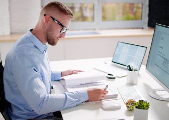 an office worker carrying out an audit